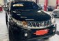 Selling Black Mitsubishi Strada 2015 in Los Baños-1