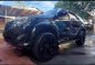 Selling Black Toyota Fortuner 2013 in Angono-0