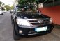 Selling Black Toyota Fortuner 2006 in Makati-0