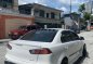White Mitsubishi Lancer 2010 for sale in Quezon City-1