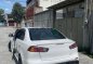 White Mitsubishi Lancer 2010 for sale in Quezon City-0