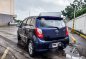 Sell Blue 2014 Toyota Wigo in Imus-1