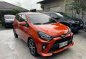 Orange Toyota Wigo 2021 for sale in Quezon City-2