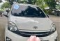 Sell White 2016 Toyota Wigo in Pililla-1