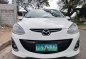 White Mazda 2 2010 for sale in Quezon City-4