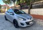 White Mazda 2 2014 for sale in Quezon City-0
