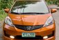 Orange Honda Jazz 2013 for sale in Las Piñas-2