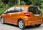 Orange Honda Jazz 2013 for sale in Las Piñas-1