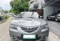 Selling White Mazda 2 2005 in Bacoor-0