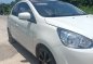 Pearl White Mitsubishi Mirage 2013 for sale in Calumpit-1