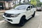 Sell White 2016 Mitsubishi Strada in Quezon City-0