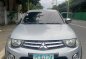 Selling White Mitsubishi Strada 2010 in Quezon City-1