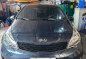 Selling White Kia Rio 2014 in Quezon City-9