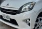 Selling White Toyota Wigo 2015 in Quezon City-4