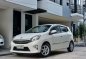 Selling White Toyota Wigo 2015 in Quezon City-9