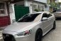 Selling White Mitsubishi Lancer 2010 in Manila-1
