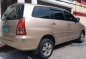 Selling White Toyota Innova 2006 in Quezon City-1