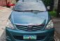 Selling White Toyota Innova 2009 in Quezon City-1