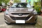 Sell Bronze 2013 Hyundai Tucson in Mandaluyong-1