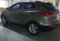 Sell Bronze 2013 Hyundai Tucson in San Juan-4