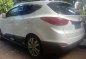 Selling White Hyundai Tucson 2012 in Quezon City-7